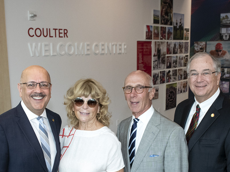 Group photo of Farnam Jahanian, Susan Coulter, David Coulter and James Rohr at the Coulter Welcome Center.
