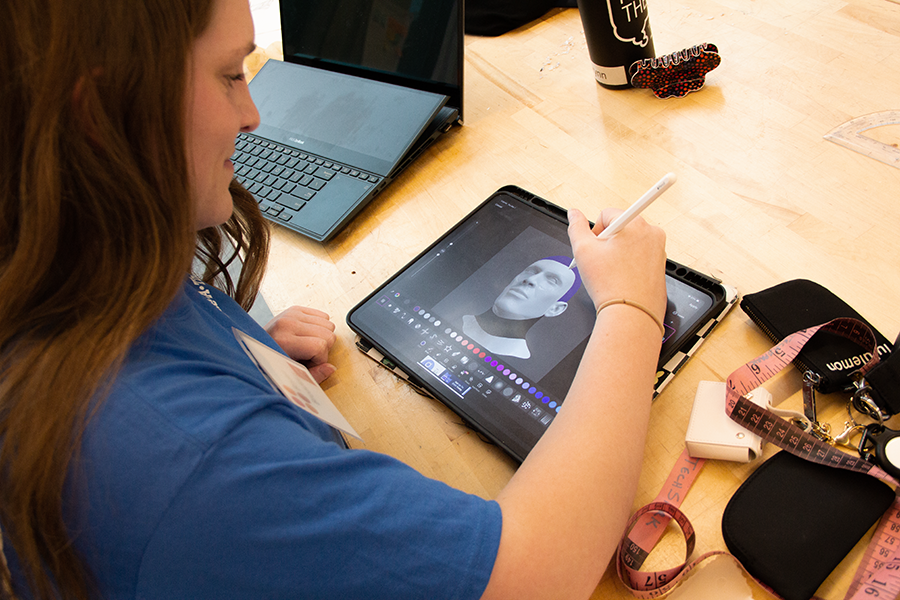 Student working on a design on a tablet